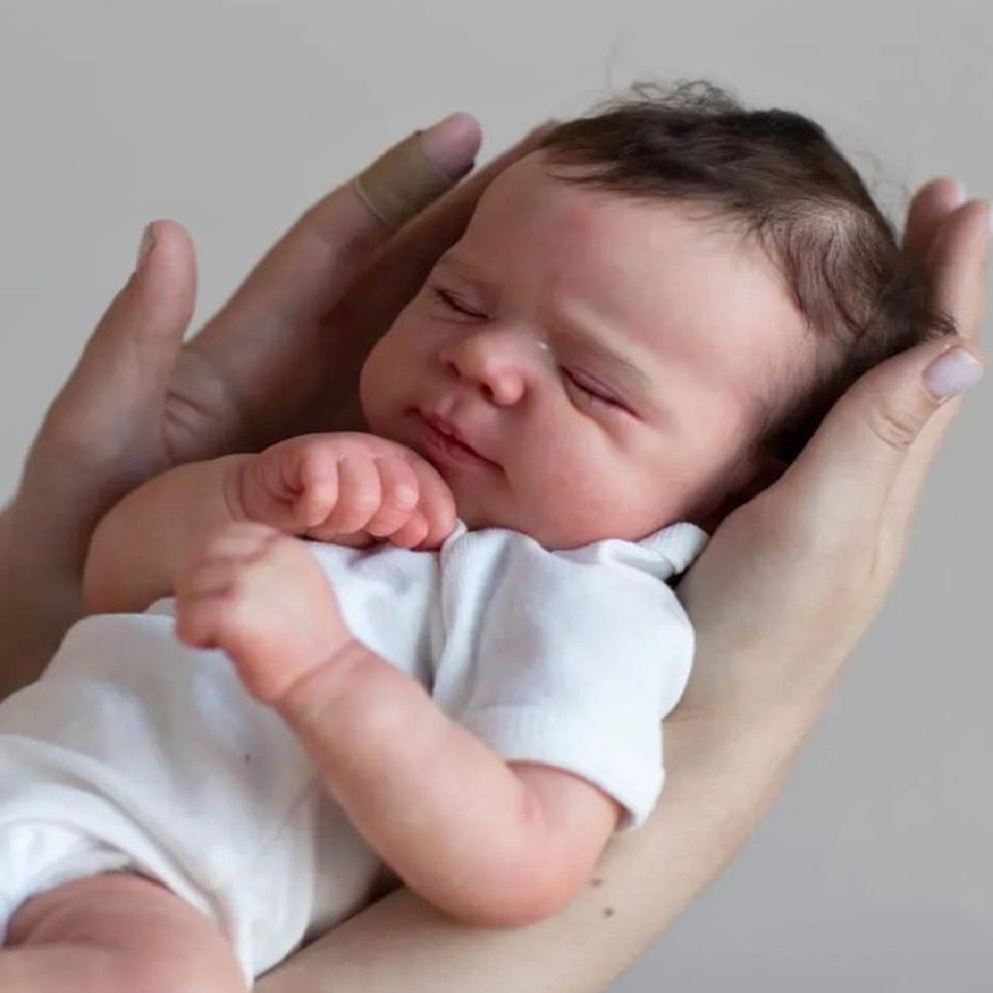 19inch Implanted Hair Reborn Baby Doll with Closed Eyes