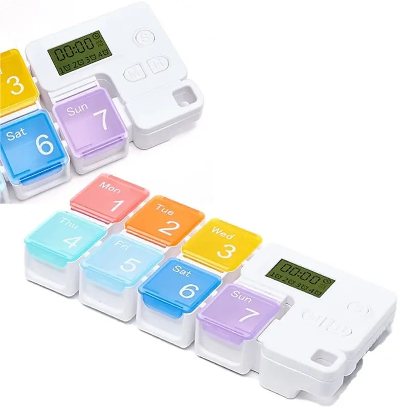 Weekly Pill Organizer with Daily Alarm Reminder.