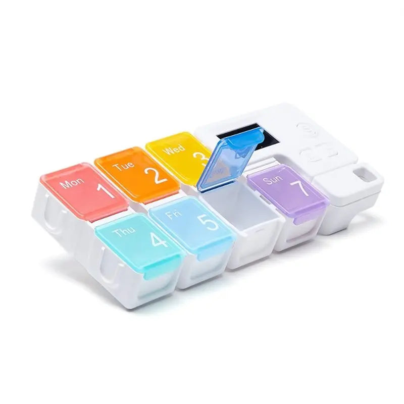 Weekly Pill Organizer with Daily Alarm Reminder.