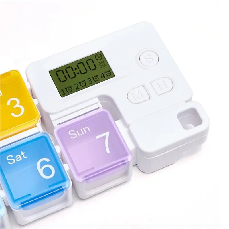 Weekly Pill Organizer with Daily Alarm Reminder.